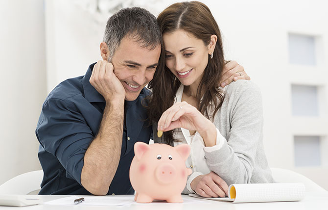 Couple With Piggy Bank Special Offers